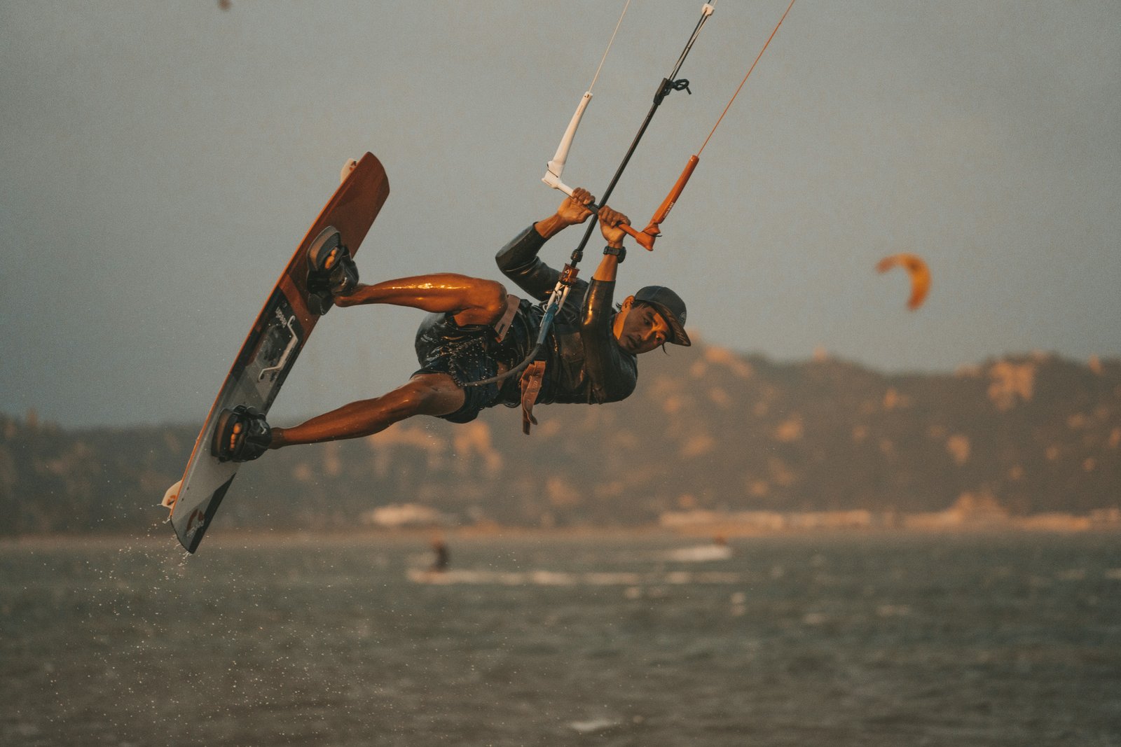 Kiteboarders riding the Atlantic surf off the Essaouira coastline in Morocco