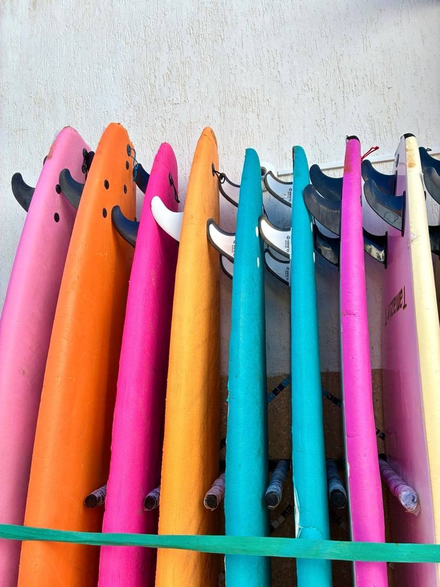 Colourful surfboards stacked in Taghazout, Morocco
