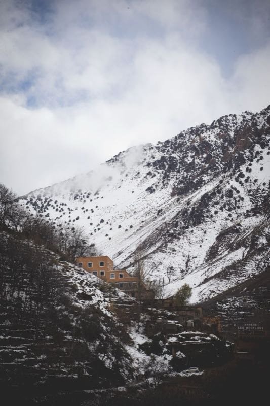 Snowy mountain slopes above the village of Imlil in the High Atlas