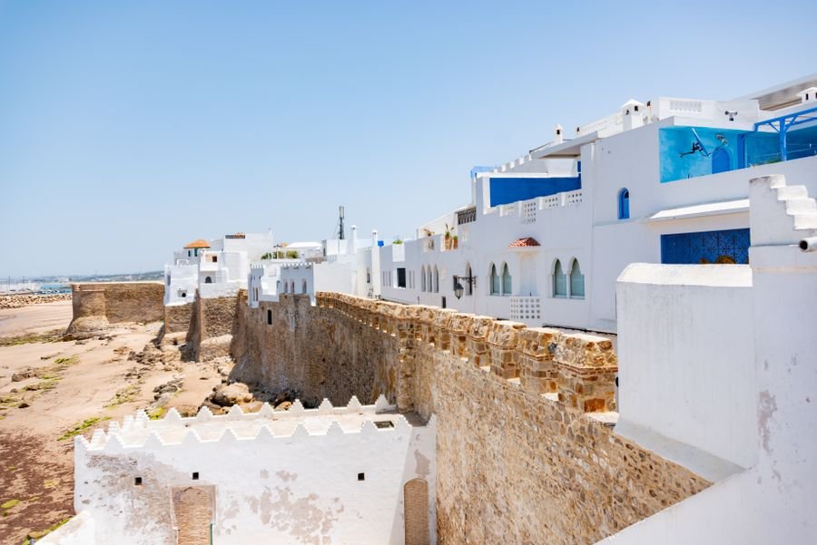 Whitewashed Essaouira medina buildings and the old ramparts beside the sea