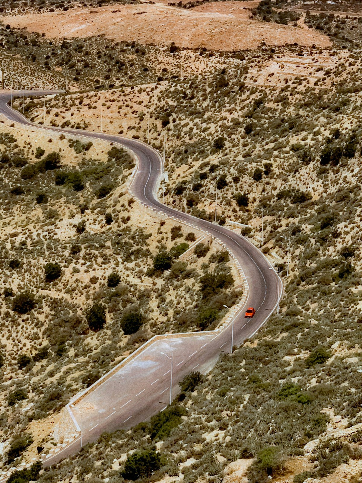 Winding road through arid mountain landscape near Agadir, Morocco