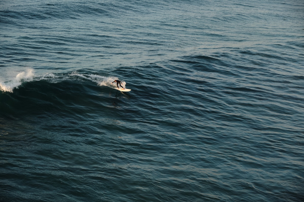 Surfer on a wave at Banana Point, Taghazout