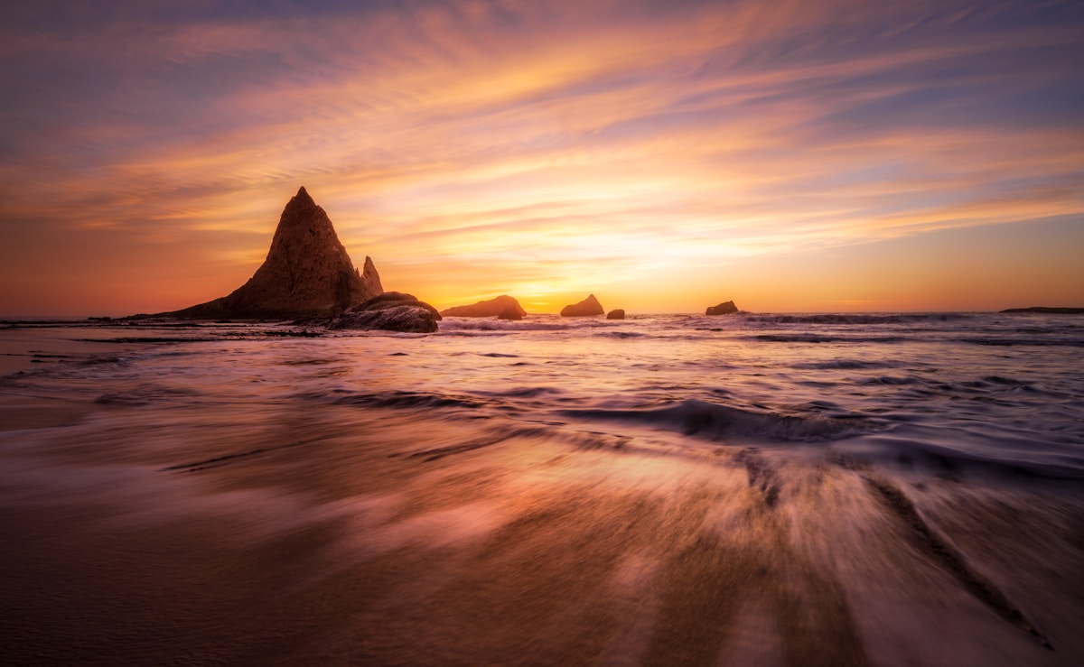 Rocky coastline at Tamraght, Morocco at sunset