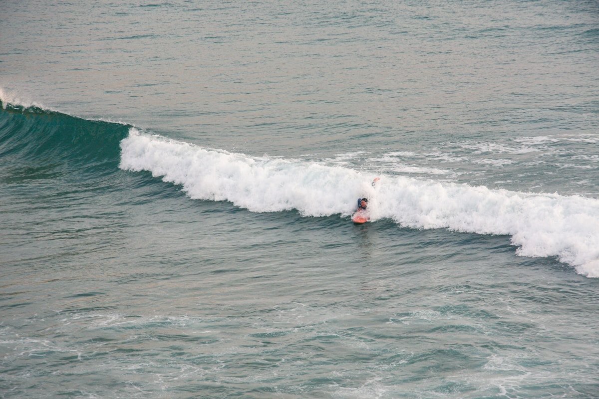 Large breaking wave with surfer, Imsouane Morocco in May
