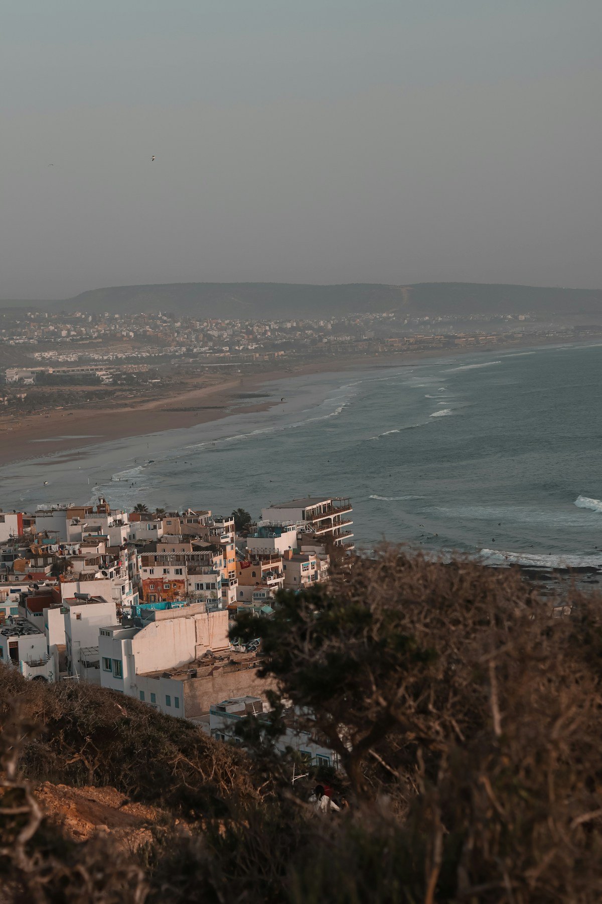 White buildings of Taghazout overlooking Atlantic Ocean in September