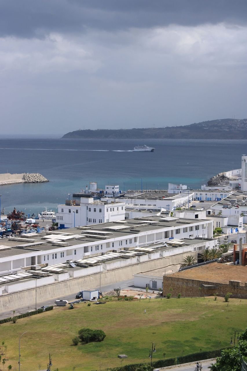 Tangier Port, Morocco, with a large ferry on the Mediterranean and the hills of Spain visible across the Strait of Gibraltar