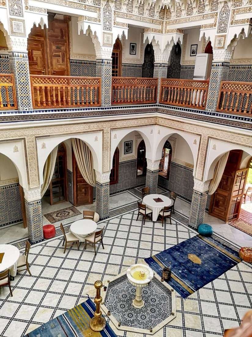 Ornate interior of a traditional Moroccan riad in Essaouira